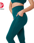 Manduka® presence legging dark deep sea