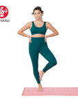 Manduka® presence legging dark deep sea