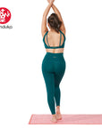 Manduka® presence legging dark deep sea